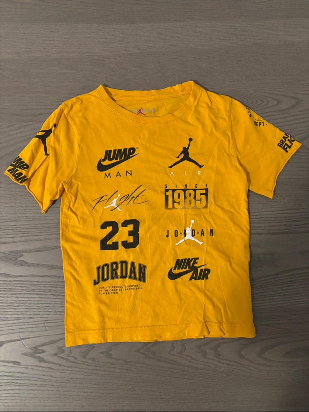Kids' Short Sleeve Graphic Tee - Yellow. Small hole in the top